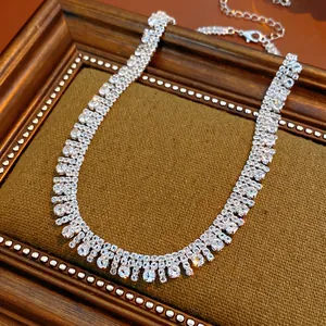 Elegant multi-layer zircon choker necklace with fringe tassels on vintage display