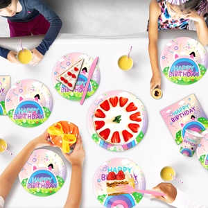 Gabby's Dollhouse themed birthday party supplies with paper plates, cups and napkins