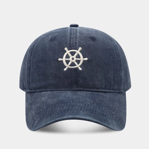 Vintage navy blue washed cotton baseball cap with white ship wheel anchor embroidery