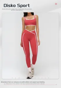 Red yoga set detail showing V-shaped waistband and white contrast piping accents