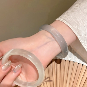 Minimalist round glaze bangle bracelet in translucent ice white and smoky grey colors