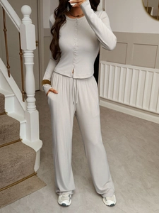 Women's light grey long-sleeved button shirt and drawstring straight-leg trousers set