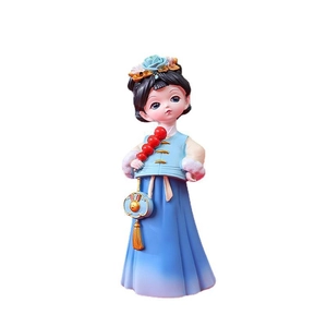 Cute chibi Hanfu girl figurine with flower hairpiece holding candied haws on white background