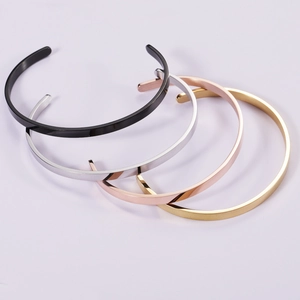 Polished C-shaped stainless steel open bangles in black, silver, rose gold, and gold finishes