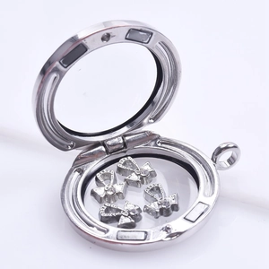 Silver floating locket pendant with three sparkling bow charms for DIY jewelry making