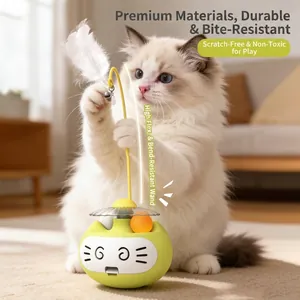 Interactive tumbler cat toy with feathers and bell, green base with cat face design