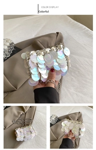 Detail view of mini chain bag featuring colorful iridescent sequins and silver strap