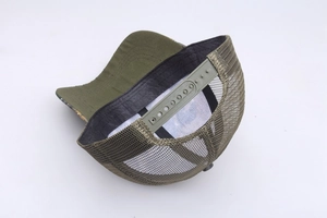 Detail view of army green camo trucker hat with breathable mesh and adjustable snapback