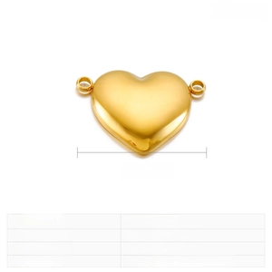 Detailed macro view of a 23mm polished gold stainless steel heart connector charm