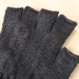 Dark gray knitted alpaca wool fingerless gloves with a soft windproof texture for outdoors