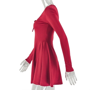 Side view of red long sleeve slim fit mini dress with pleated details on white background