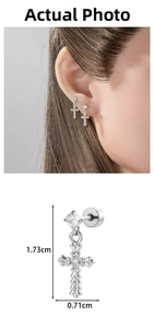 Detail showing Gothic cross earrings dimensions of 1.73cm x 0.71cm with zircon inlay