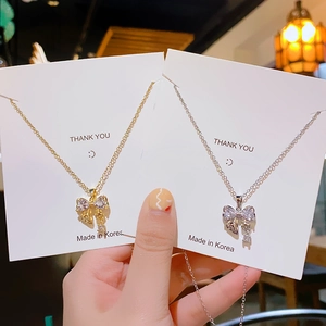 Collier Pendentif Nœud Zircon Acier Titane Cuivre Bijou Élégant Cadeau Pour Femmes