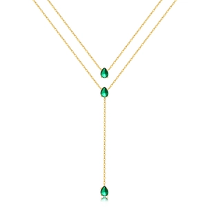 Detailed view of double-layer Y-shaped gold necklace with emerald green teardrop gems