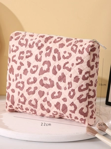 Leopard print quilted makeup bag showing dimensions 22x19x5cm with top zipper closure