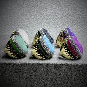 Set of adjustable gold rings with oval natural crystals and sparkling rhinestone halos