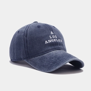 Vintage washed blue cotton baseball cap with A Los Angeles embroidery shown from a side view