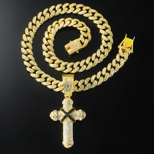 Iced-out gold cross pendant on cuban link chain with sparkling rhinestones for men
