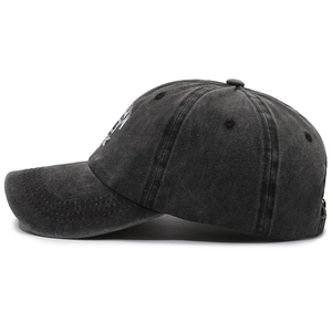 Distressed dark gray baseball cap with white letter embroidery and a curved brim