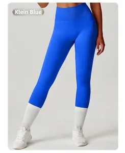Detailed shot of Klein blue high-waisted yoga leggings featuring side pockets and seamless fit