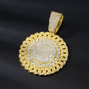 Iced out gold plated circular pendant with clear crystals and matching Cuban link chain