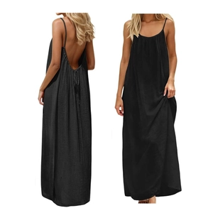 Macro view of black backless maxi dress with thin straps and deep V-neck design