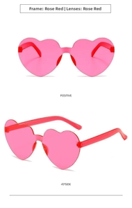 Macro view of rose pink heart-shaped rimless sunglasses from front and side angles