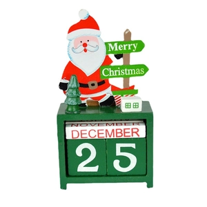 Wooden Santa Claus advent calendar block set with Merry Christmas sign on white backdrop