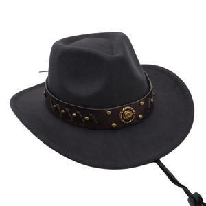 Detail of western felt cowboy hat with brown leather rivet band and decorative gold buckle