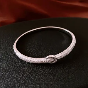 Luxury 18K gold plated bangle with pavé micro-set cubic zirconia and buckle closure
