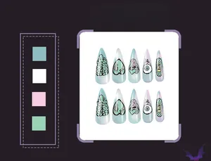 Detailed view of Halloween press-on nails with creepy brain and eyeball graffiti designs