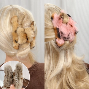 Faux rabbit fur oversized hair claw clips in brown and pink leopard print patterns