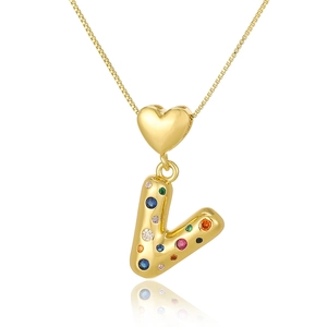 Close-up of gold heart connector and multi-colored zircon letter L pendant necklace