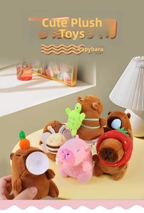 Variety of cute Capybara plush keychains with strawberry hats and turtle backpacks
