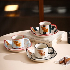Three-piece set of striped ceramic coffee mugs and saucers with 3D puppy dog decoration