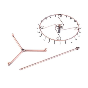 Disassembled parts of bronze iron jewelry display stand with hooks and tripod base