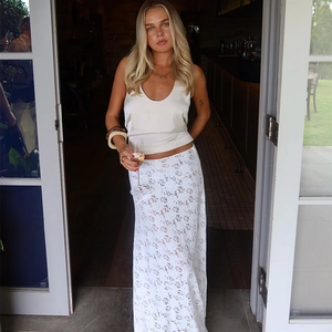 Elegant white lace high waist maxi skirt with floral hollow pattern for summer fashion