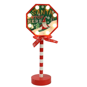 LED wooden Santa Stop Here decorative light with red striped pole and green octagonal sign