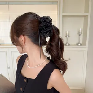 Elegant black ribbon mesh banana clip hair bow for voluminous ponytail hairstyles