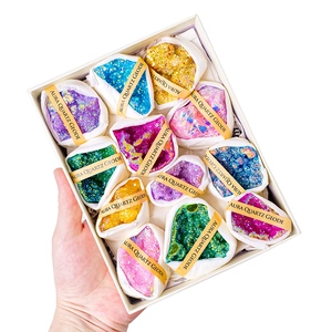 Set of 12 colorful aura quartz geode specimens in a gift box for educational discovery
