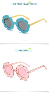 Detail view of flower-shaped children's sunglasses in light blue, yellow, and pink frames
