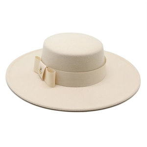 Elegant cream wool felt boater hat with a wide brim and a small golden bee accessory