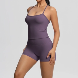 Close-up of dark purple brushed yoga set with racerback tank top and high waist shorts