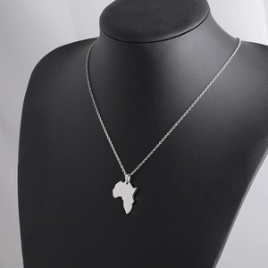 Detailed view of silver Africa map pendant necklace on a black jewelry mannequin