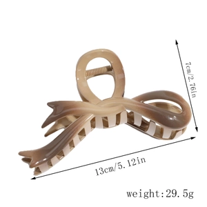 Detail showing gradient butterfly hair claw dimensions of 13cm length and 7cm height