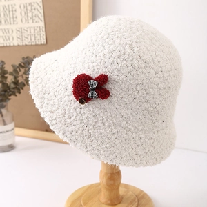 Cute white sherpa bucket hat for women with a plush bunny and red bow detail