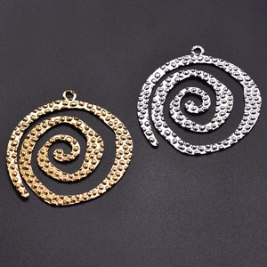 Textured gold and silver spiral pendants made of 304 stainless steel on black background