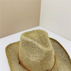 Close-up of hollow breathable straw cowboy hat showing hand-woven texture and cord