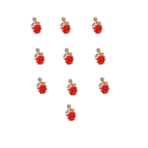 Detailed view of ten red enamel strawberry pendants with gold leaves for DIY jewelry making