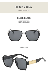 Detail of trendy black polygon oversized sunglasses with stylish gold temple accents